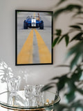 Blue Roadster Waving Drive