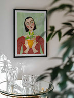 Woman Holding Green Plant, arte de Sharyn Bursic
