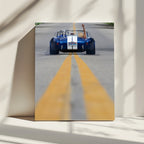 Blue Roadster Waving Drive