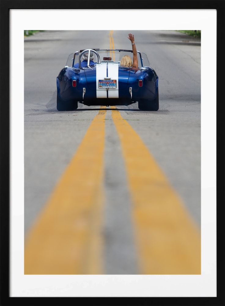 Blue Roadster Waving Drive