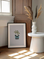 Floral Typewriter Dreams, arte de Frida Floral Studio enmarcado en una pared