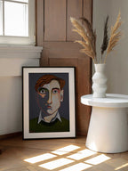 Albert Blending In, arte de Sharyn Bursic enmarcado en una pared