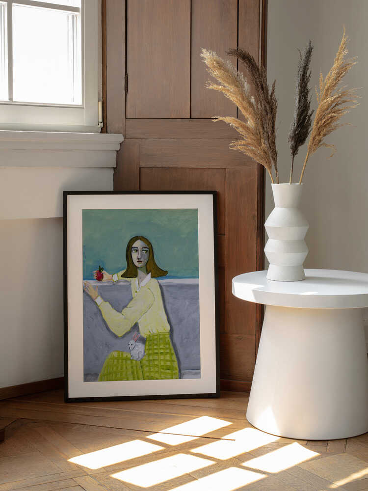 Pensive Girl and Rabbit, arte de Sharyn Bursic enmarcado en una pared