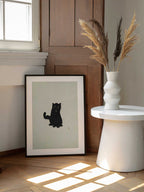 Charming Black Cat, arte de Dianne Nicole Fernando enmarcado en una pared