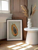 Vibrant Papaya Half, arte de Josie George enmarcado en una pared
