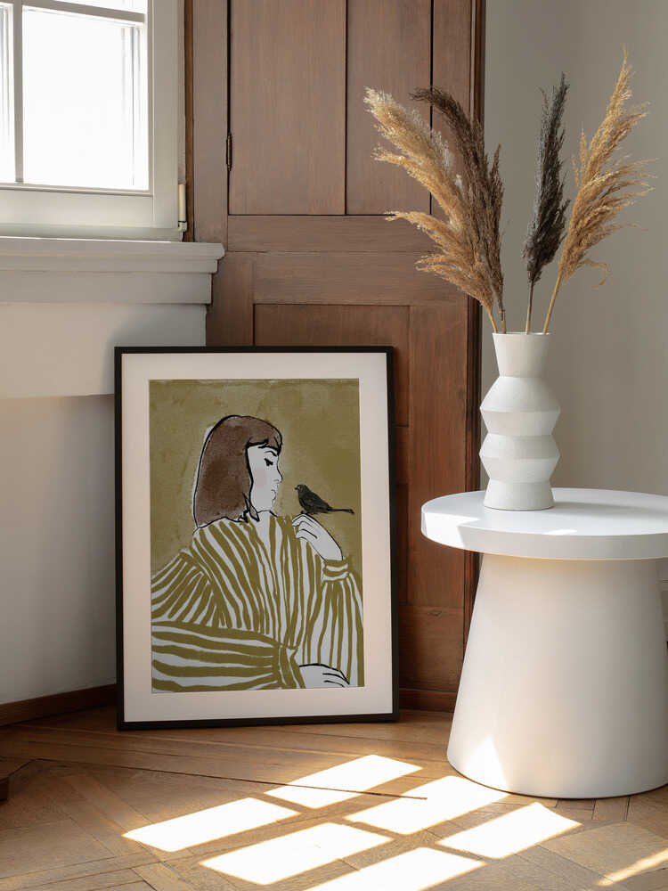 Woman with a Bird, arte de CATS AND DOTZ enmarcado en una pared