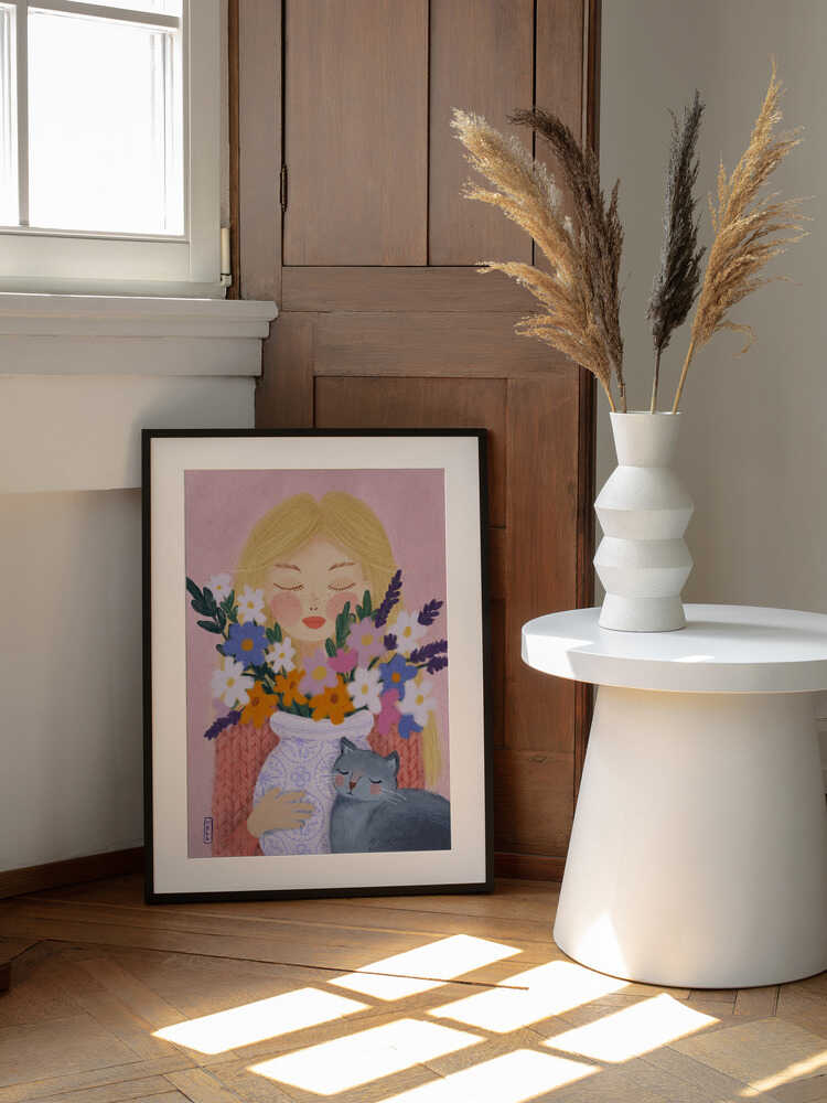 Dreamy Girl Cat Flowers, arte de Dirkie Nell enmarcado en una pared