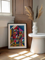 Vibrant Geometric Town, arte de Aniko Hencz enmarcado en una pared