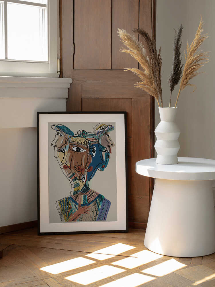 Multifaceted Faces, arte de GIovanna Gil Alves enmarcado en una pared