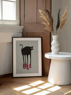 Funny Black Cat Boots, arte de The Art Concept enmarcado en una pared