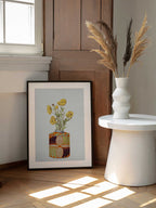 Yellow Flowers Orange Vase, arte de Wild Violets enmarcado en una pared